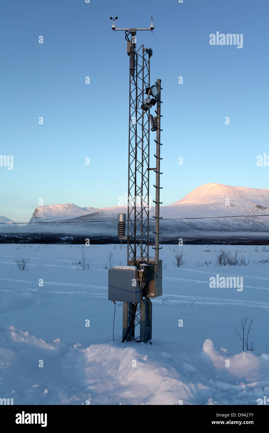 Weather station in snowy landscape Stock Photo