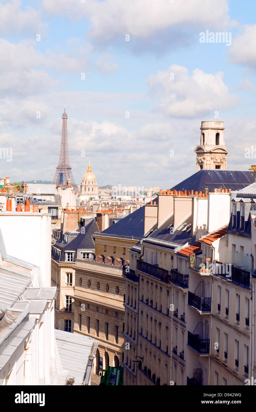 rooftops of Paris France Europe residential neighborhood Latin Quarter with view of Eiffel Tower and Dome of Invalides Stock Photo