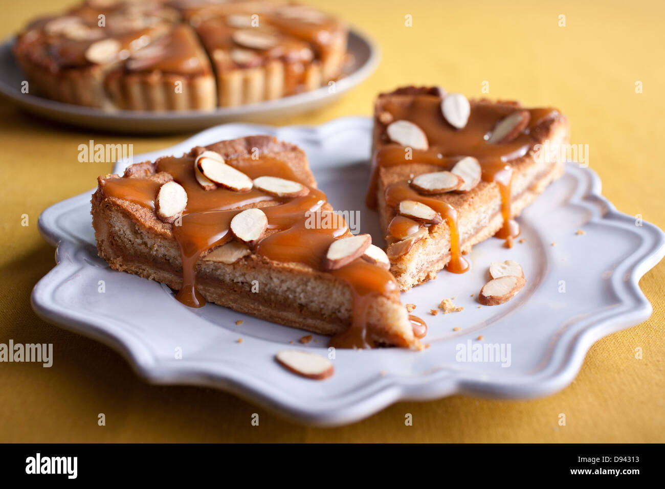 almond torte cut and ready to serve Stock Photo