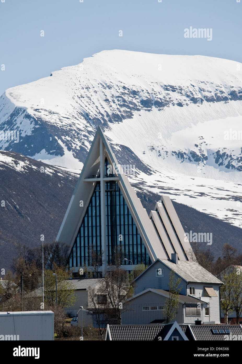 Church with snowcapped mountain in background Stock Photo