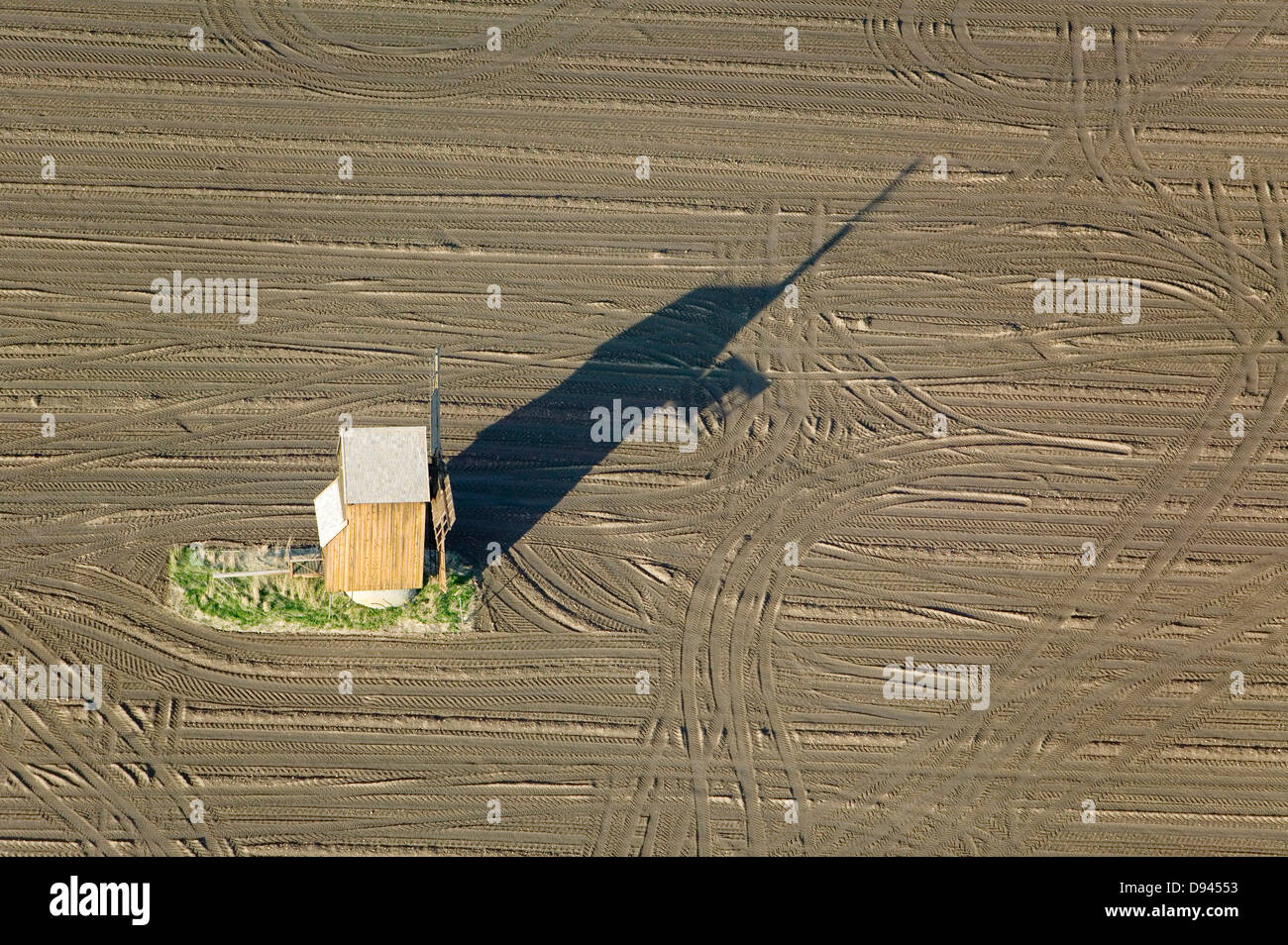 A windmill on a cropland, Gotland, Sweden. Stock Photo