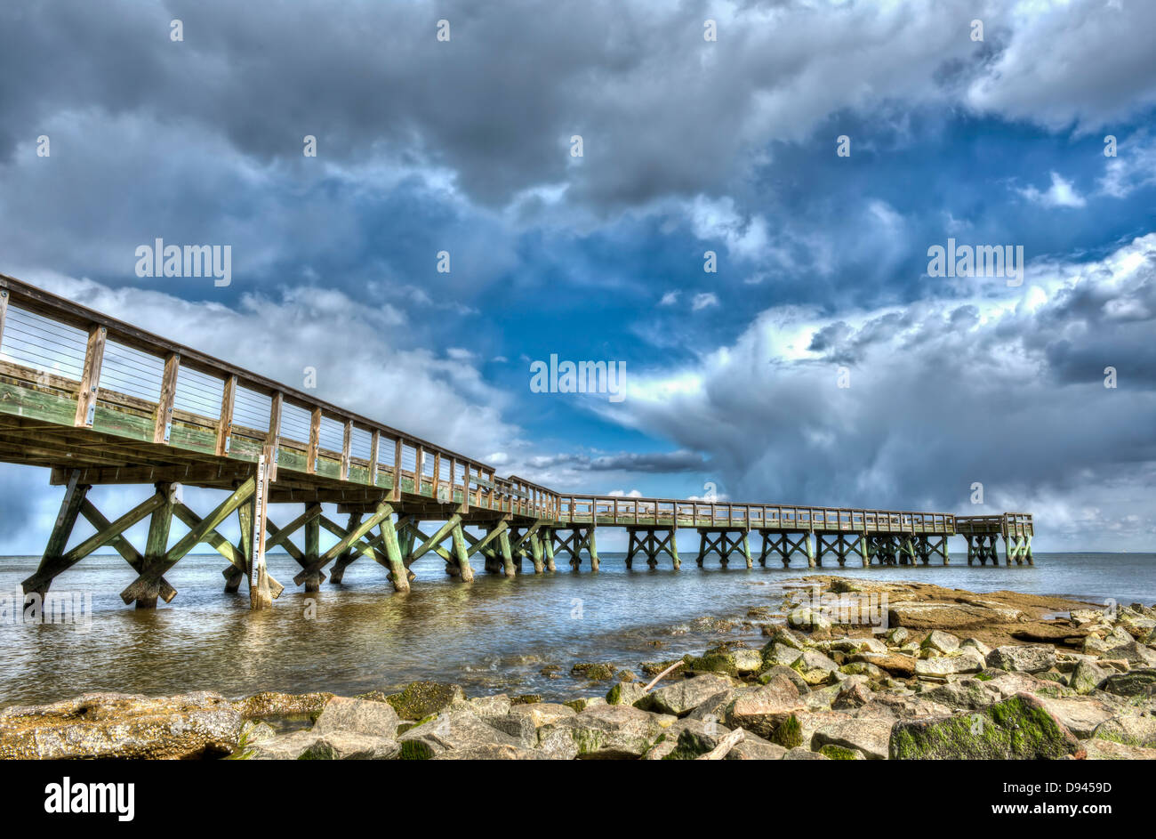 A fishing pier on the Chesapeake bay in Maryland during summer Stock Photo