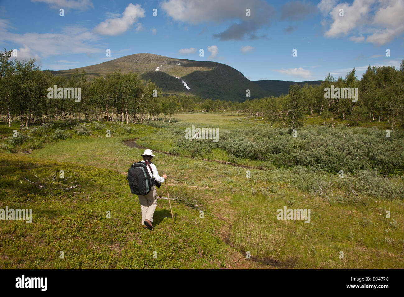 Man and women hiking hi-res stock photography and images - Alamy