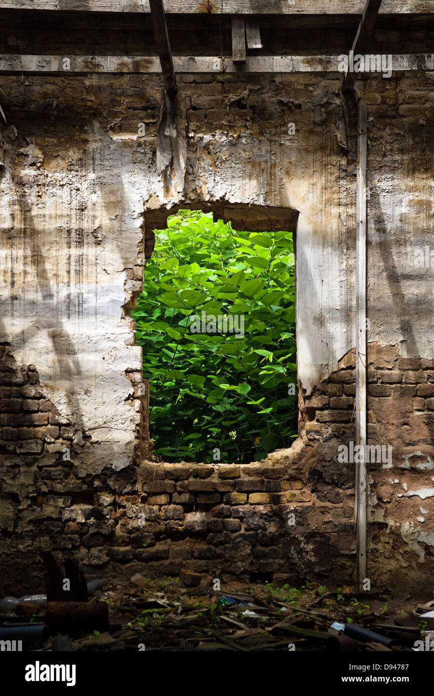 Abandoned window of an old factory, obsolete brick wall Stock Photo - Alamy