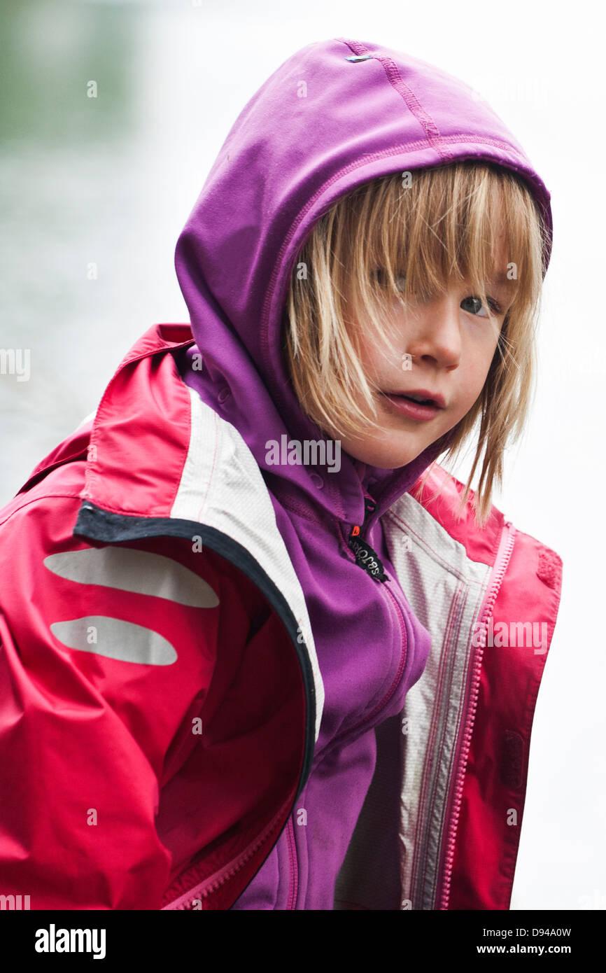 Wearing raincoat hires stock photography and images Alamy