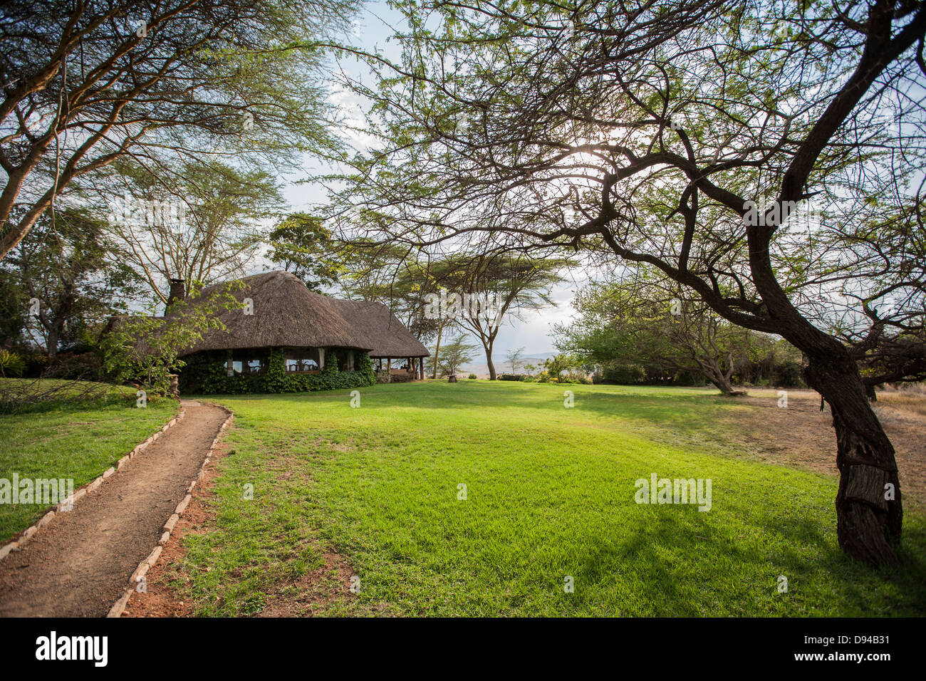 safari lodge on a grassy hill side Stock Photo