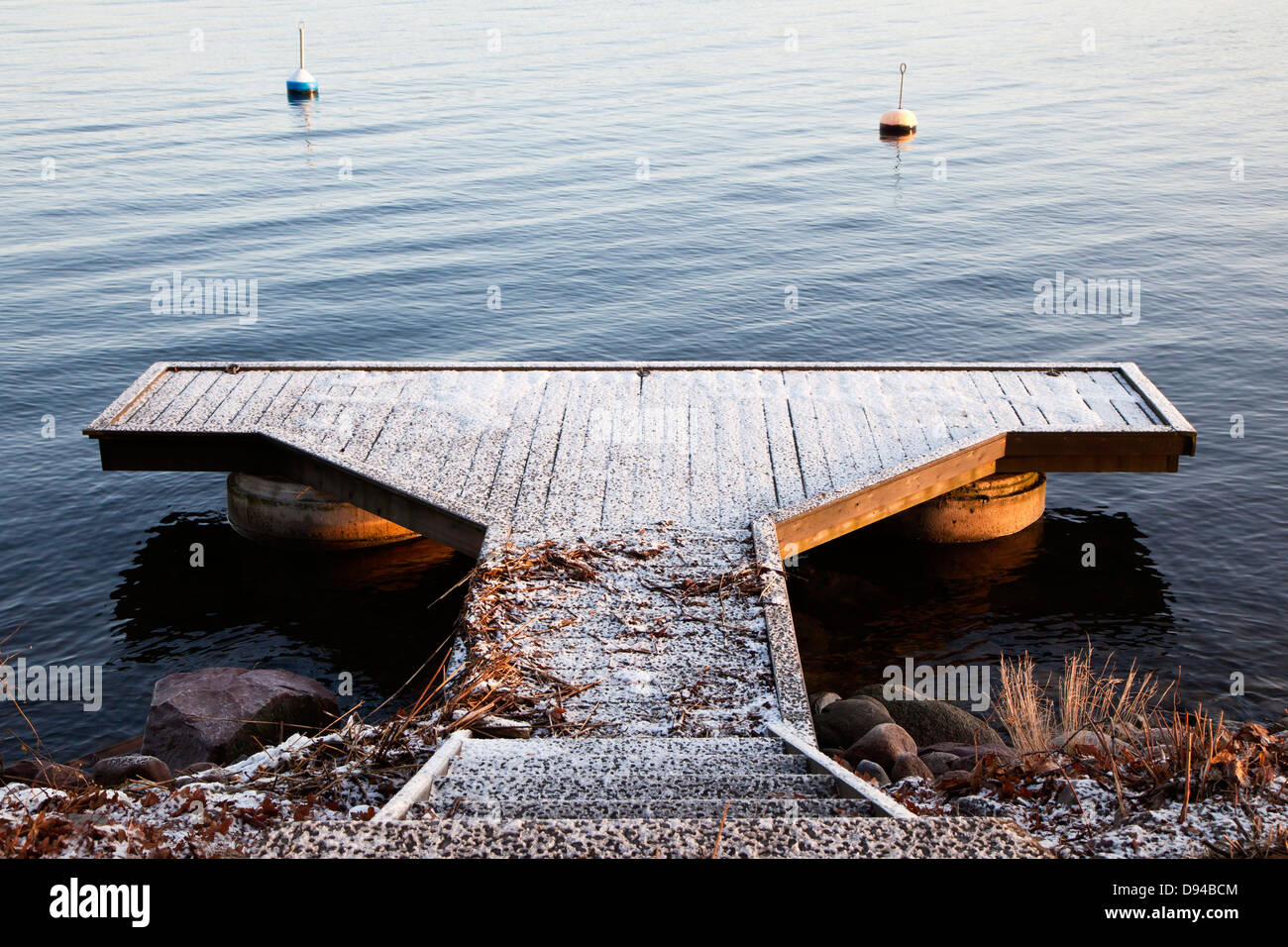 Jetty covered with snow Stock Photo