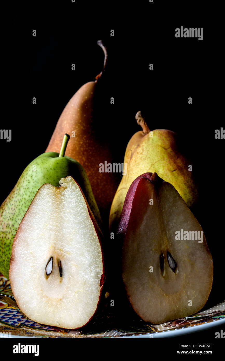 Fruit plate with pears on black background Stock Photo