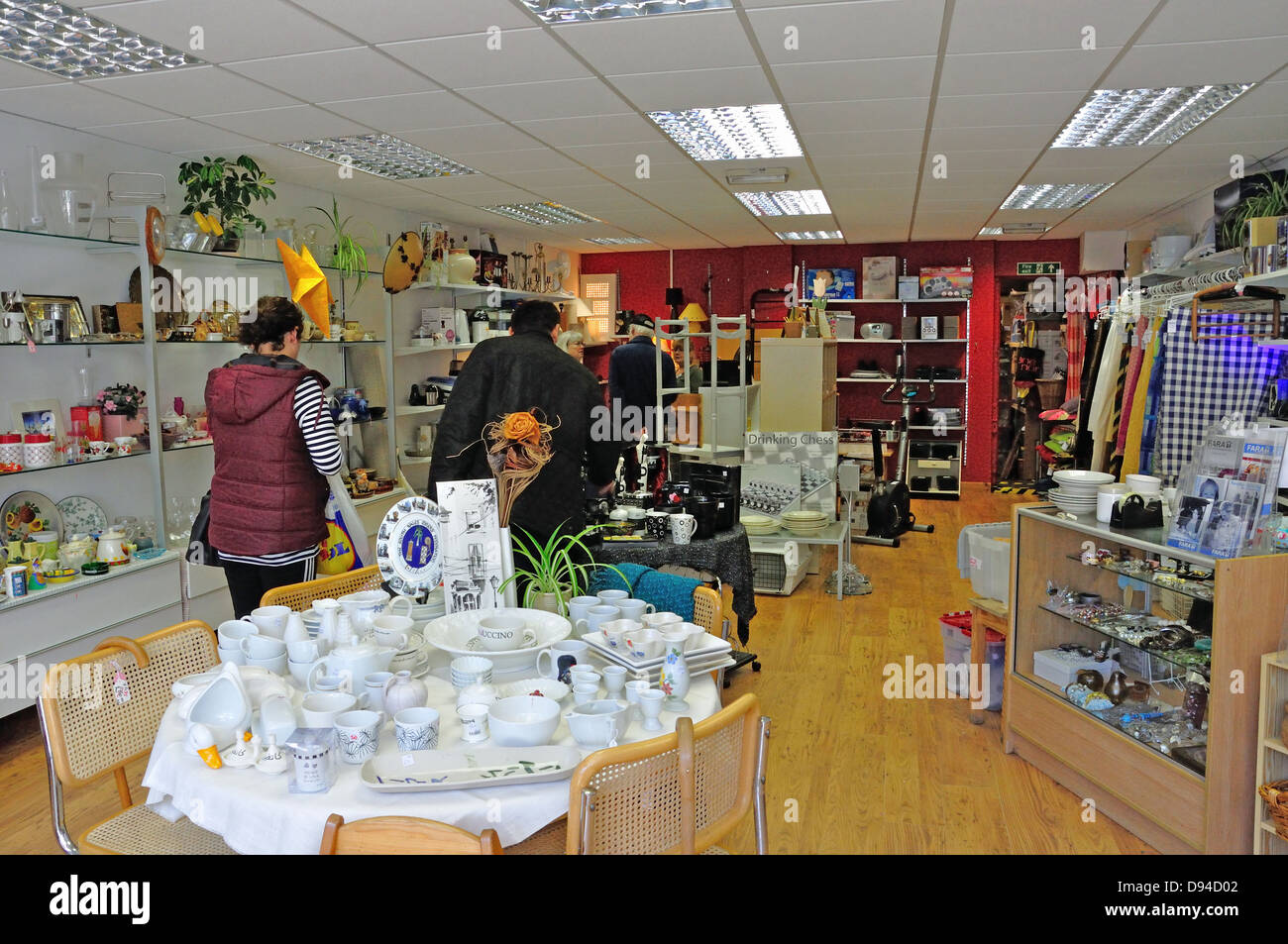 'Fara' charity shop interior, High Street, Whitton, London Borough of