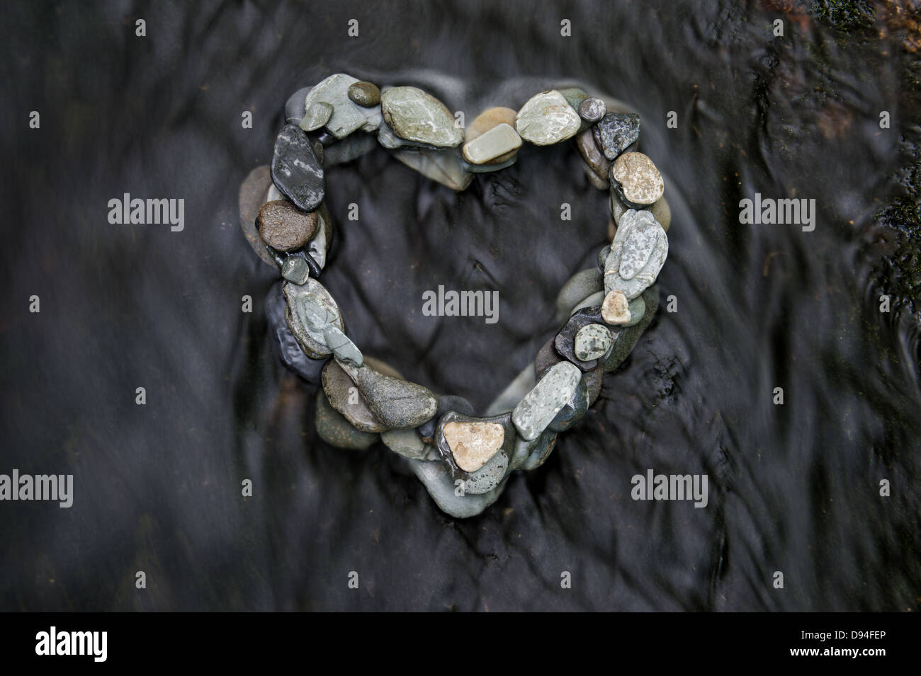 Heart Shape Pebble sculpture in Venford brook, Dartmoor, Devon Stock Photo