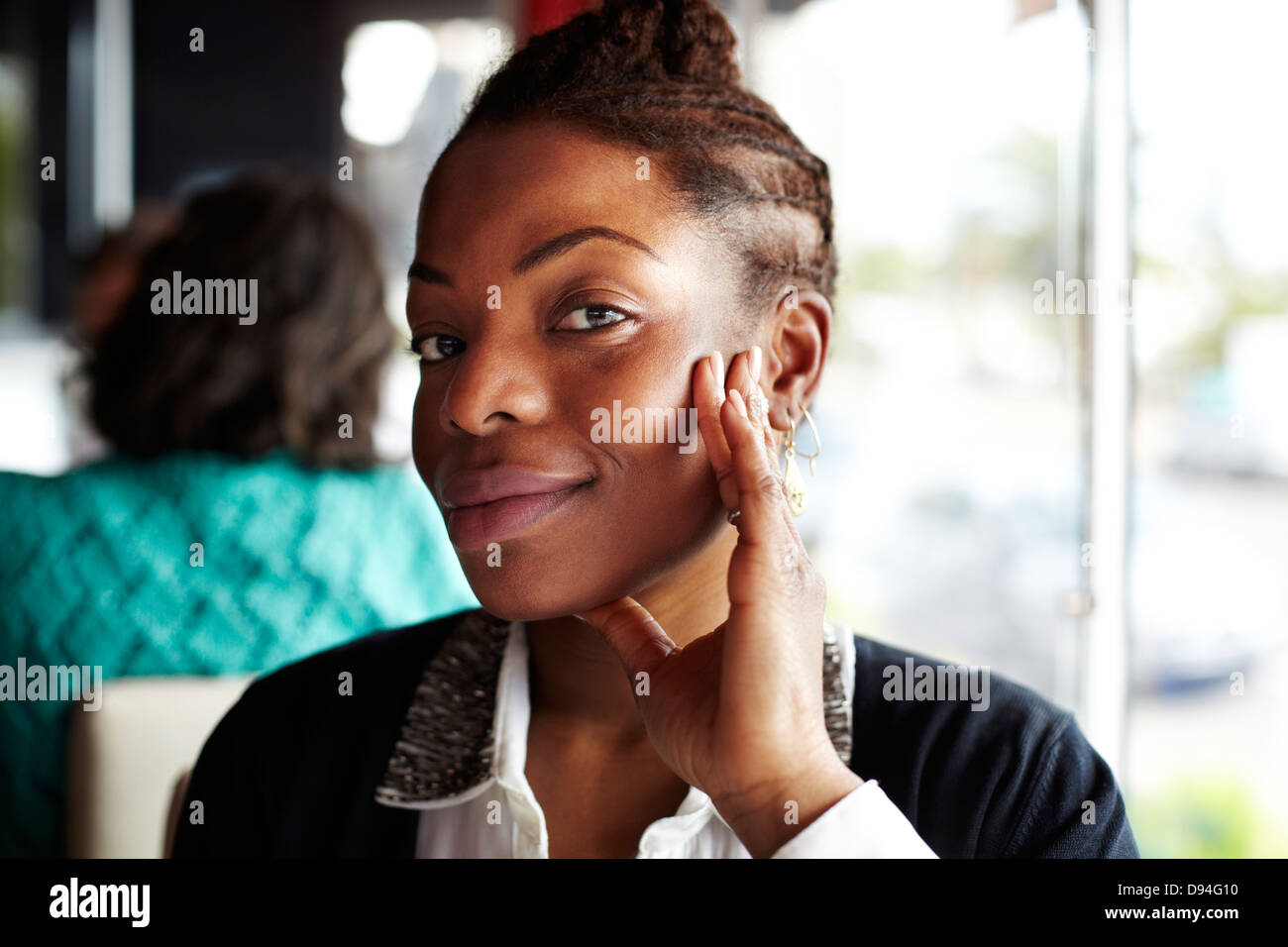Smiling businesswoman in black hi-res stock photography and images - Alamy