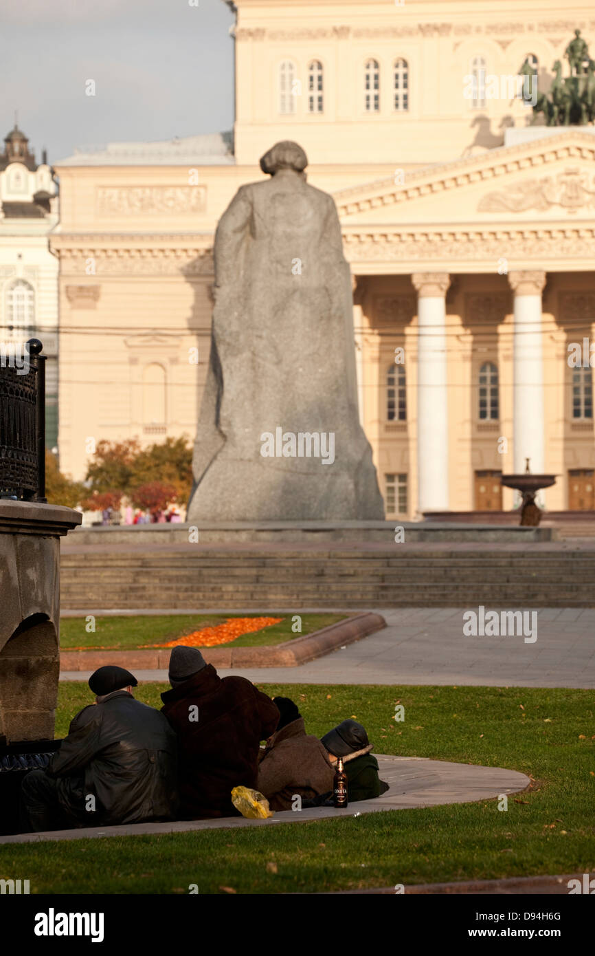 homeless people in a park at bolshoi theatre, moscow, russia Stock Photo