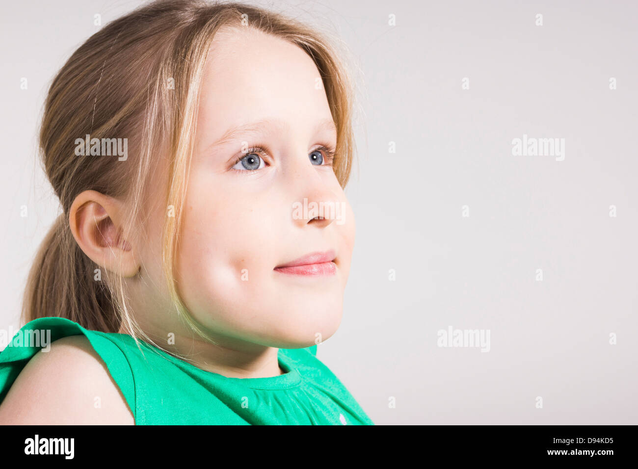 Head and Shoulders Portrait of Girl in Studio Stock Photo