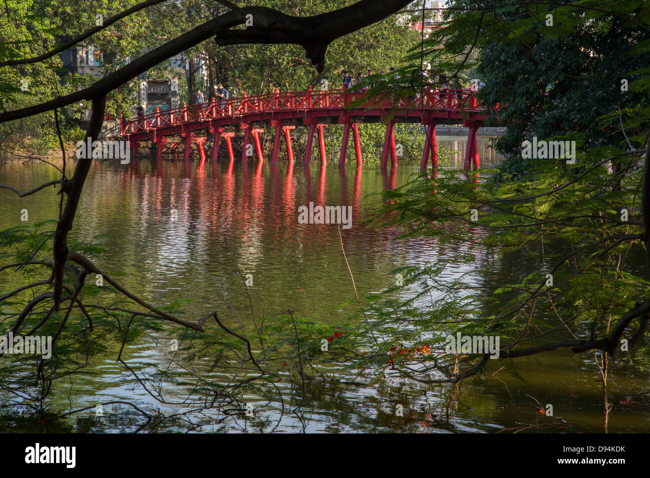 Huc Bridge or 'bridge where light is absorbed' over Hoan Kiem Lake - Lake of the Returned Sword Stock Photo