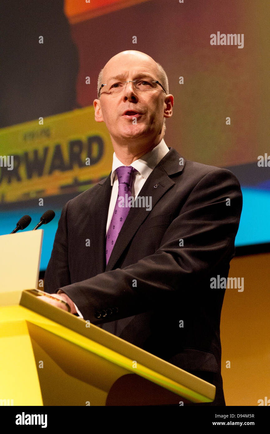 MSP and Cabinet Secretary for Finance, John Swinney addresses delegates at the Scottish National Party Conference Stock Photo