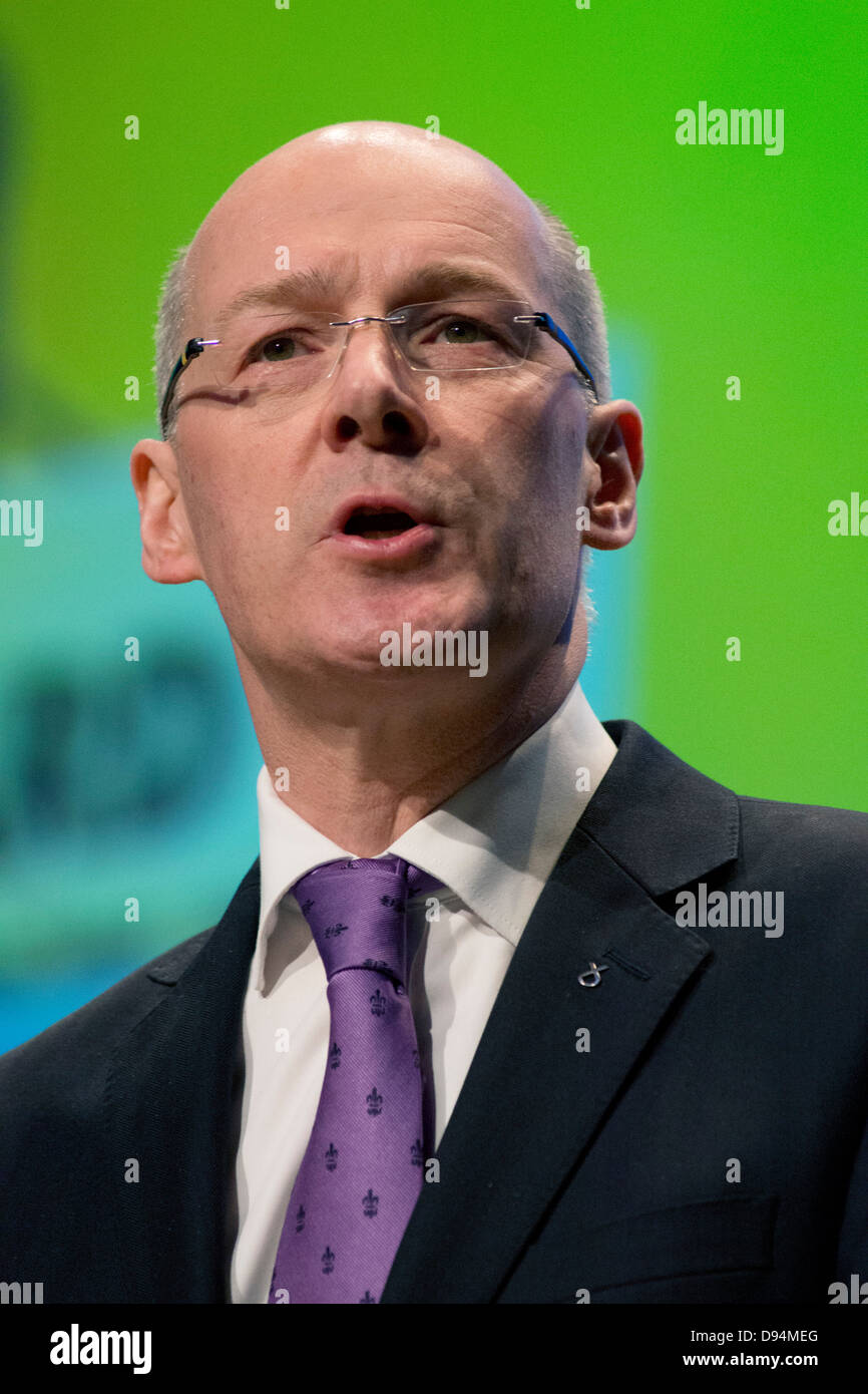 MSP and Cabinet Secretary for Finance, John Swinney addresses delegates at the Scottish National Party Conference Stock Photo