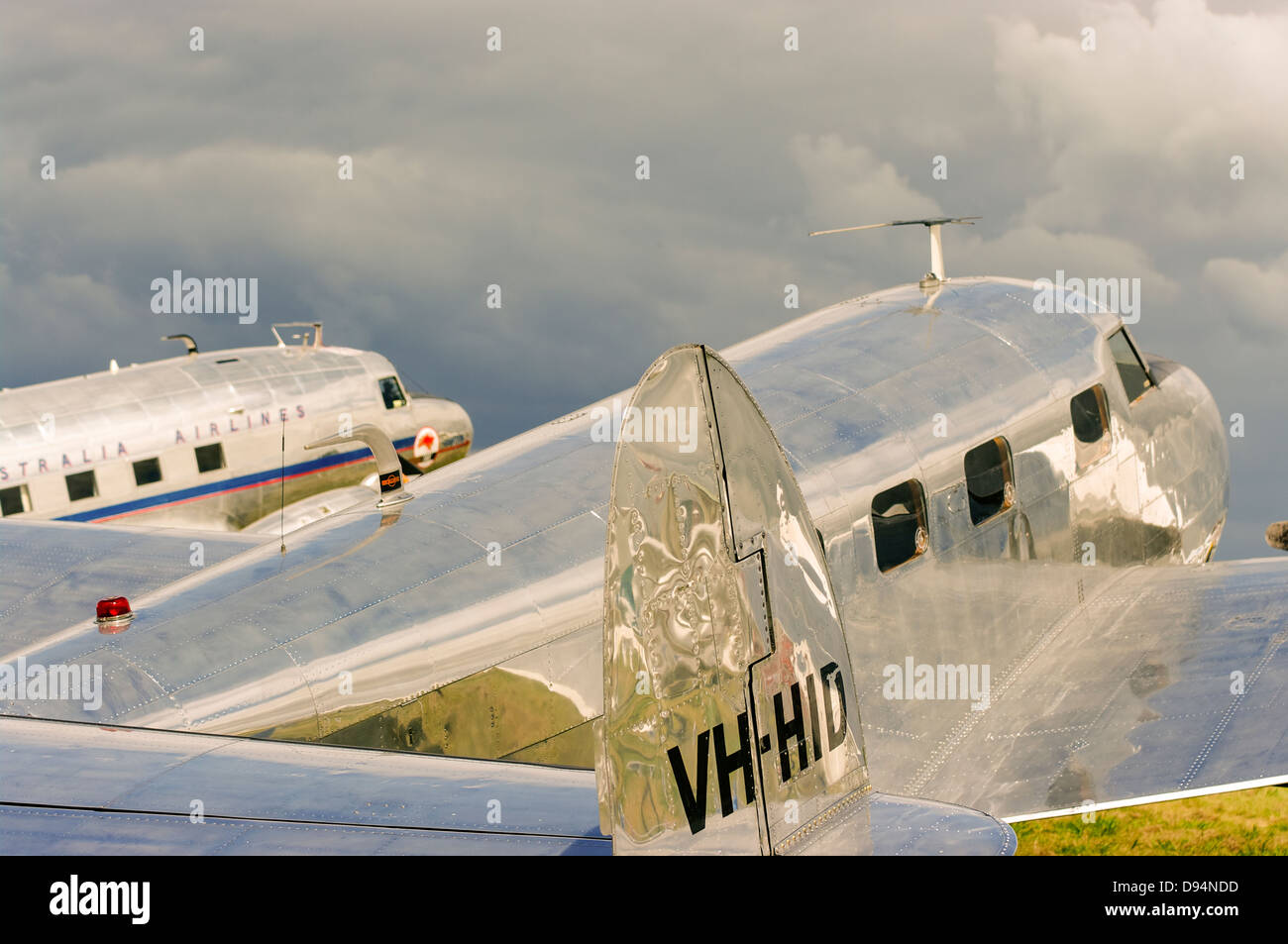 Tail view of a Lockheed Electra 12a Junior with a former Australian Airlines DC-3 behind. Stock Photo