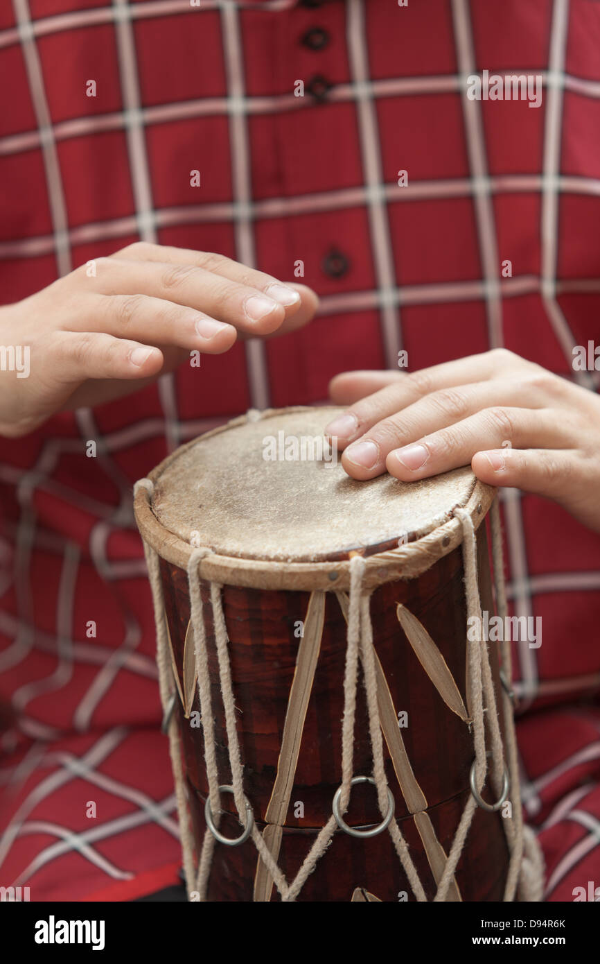 Men's hands beat the drum Stock Photo Alamy