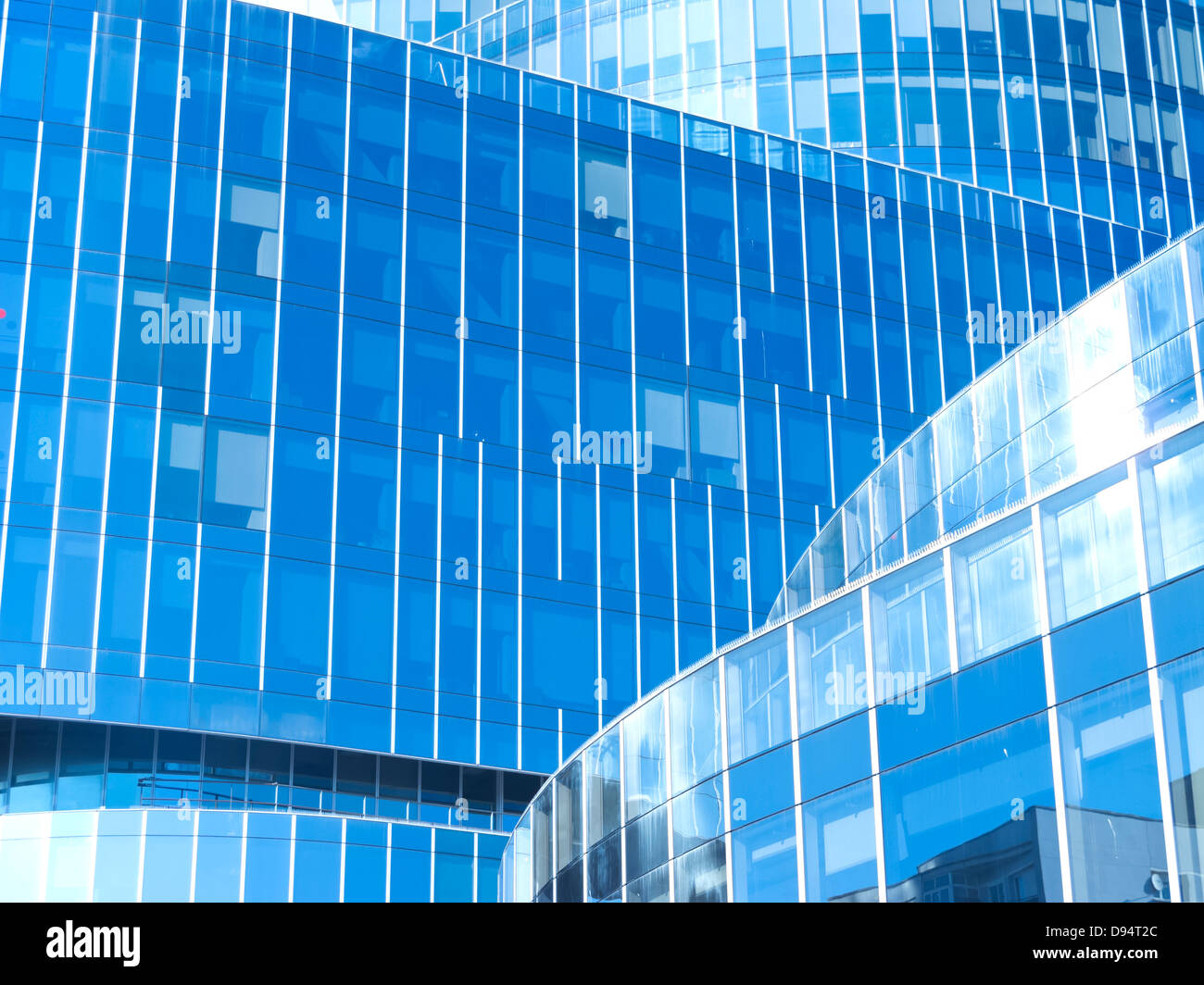 Modern office building with blue glass facade futuristic Stock Photo ...