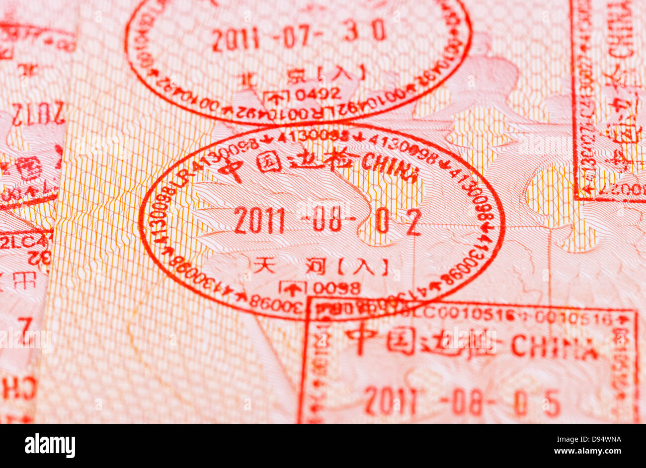 Chinese Visa entry and exit stamps in passport Stock Photo Alamy