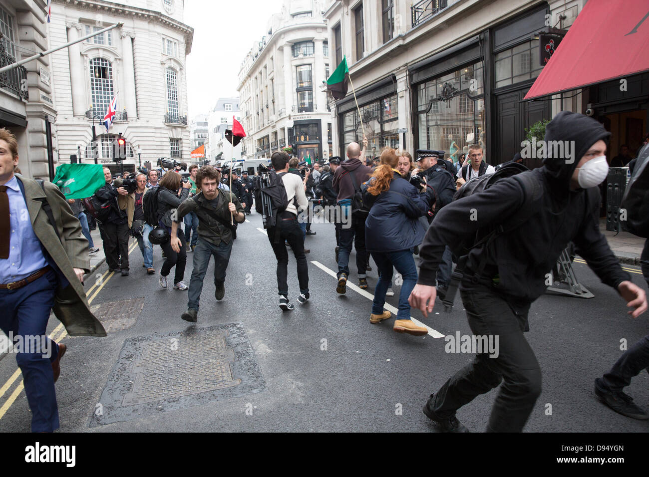 London, UK. 11th June 2013. Anti G8 protesters in scuffles with  police. Credit:  Lydia Pagoni/Alamy Live News Stock Photo