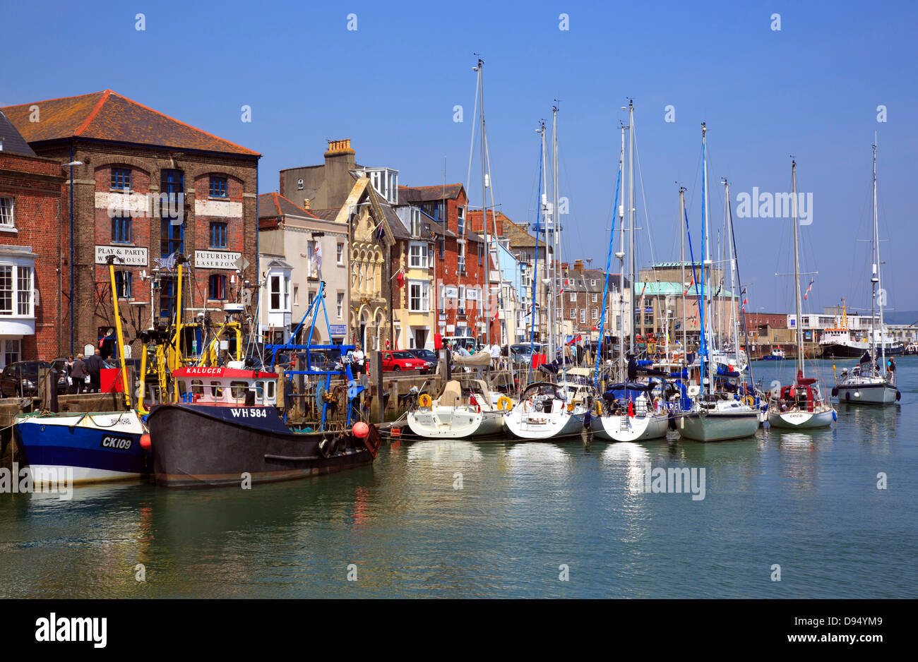 Boats in Weymouth harbour Water Stock Photo