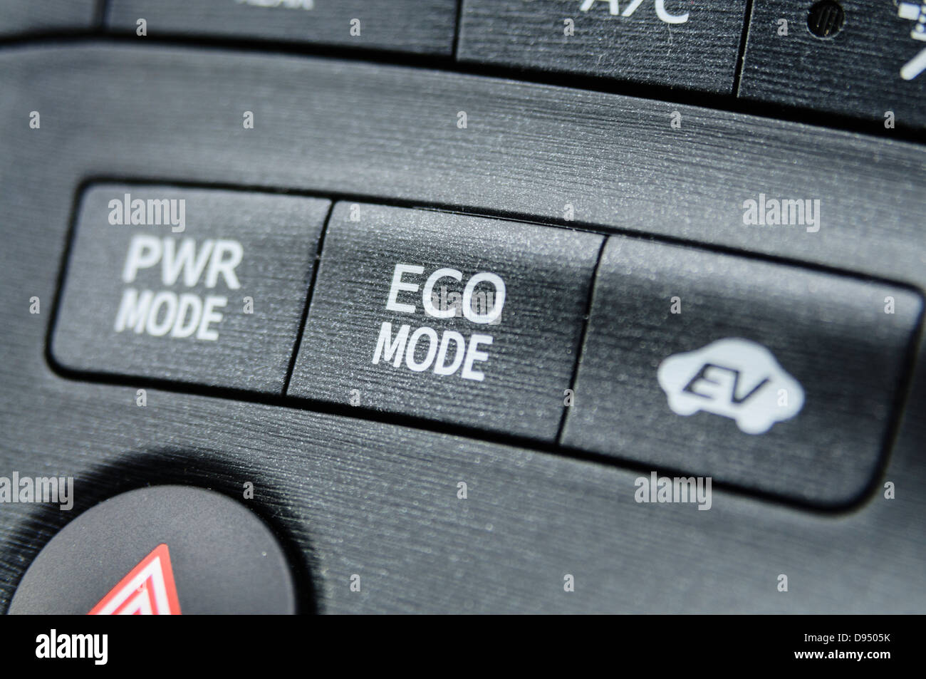 Power mode, Eco mode, and Electric Vehicle (EV) mode buttons on a 2012 Toyota Prius Stock Photo