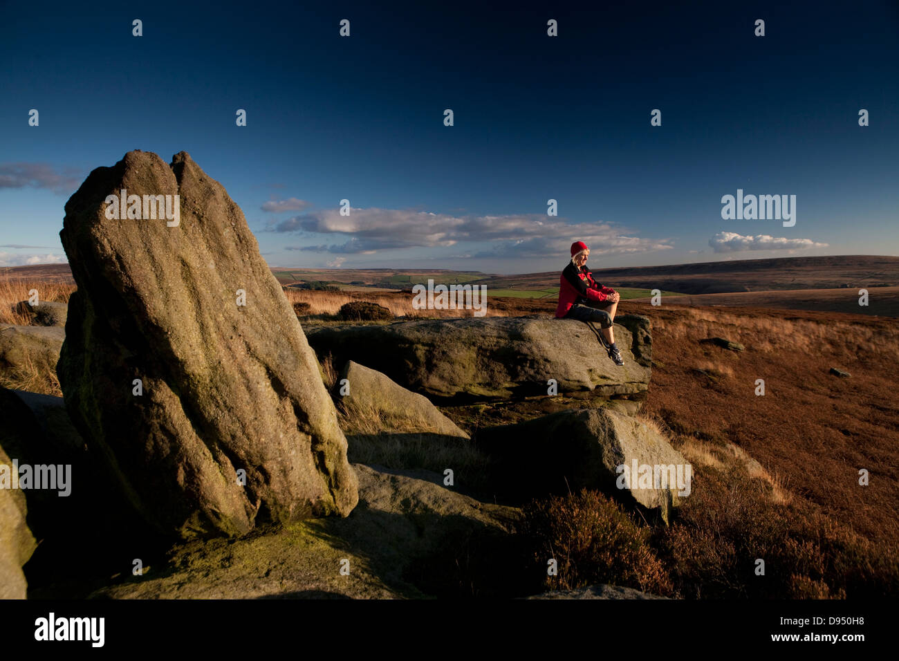 Walking on the hills at Widdop above Hebden Bridge and admiring the view Stock Photo