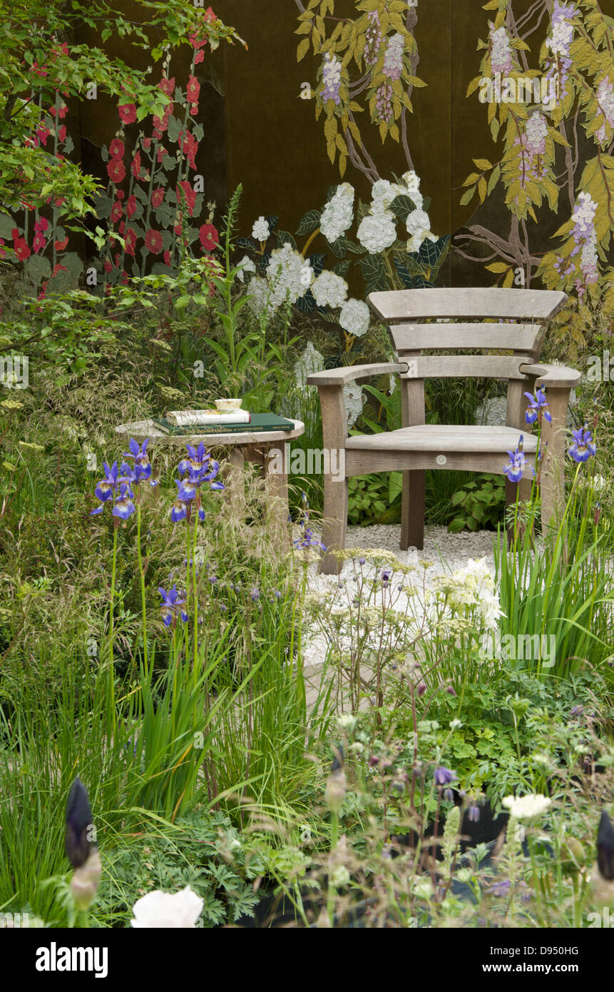 seating area in the massachusetts garden at rhs chelsea flower show