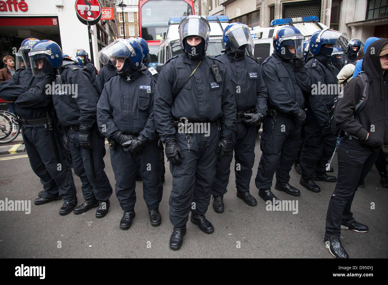 Demonstration against the upcoming G8 summit in central London, UK. Police in riot gear cordoned off a part of Beak St. in Soho where activists who were planning a big protest were being surrounded. Stock Photo