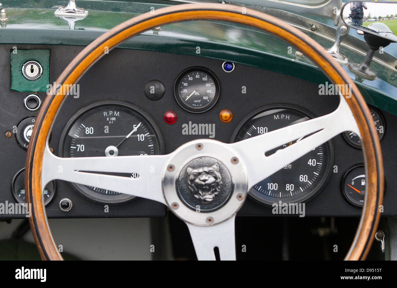 Interior dashboard of a classic Jaguar car pictured outdoors Stock