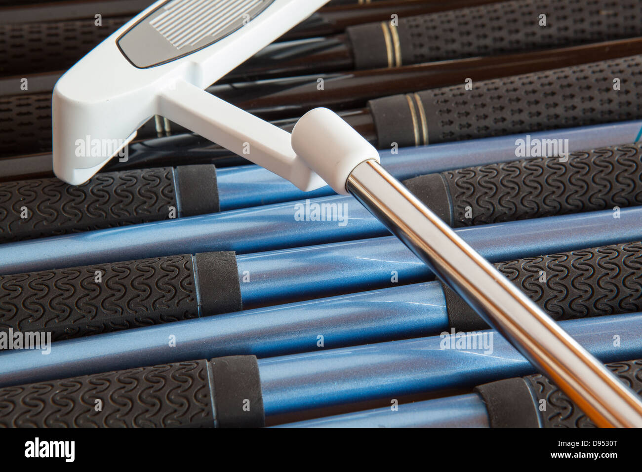 Detail of golf putter and different golf clubs Stock Photo Alamy