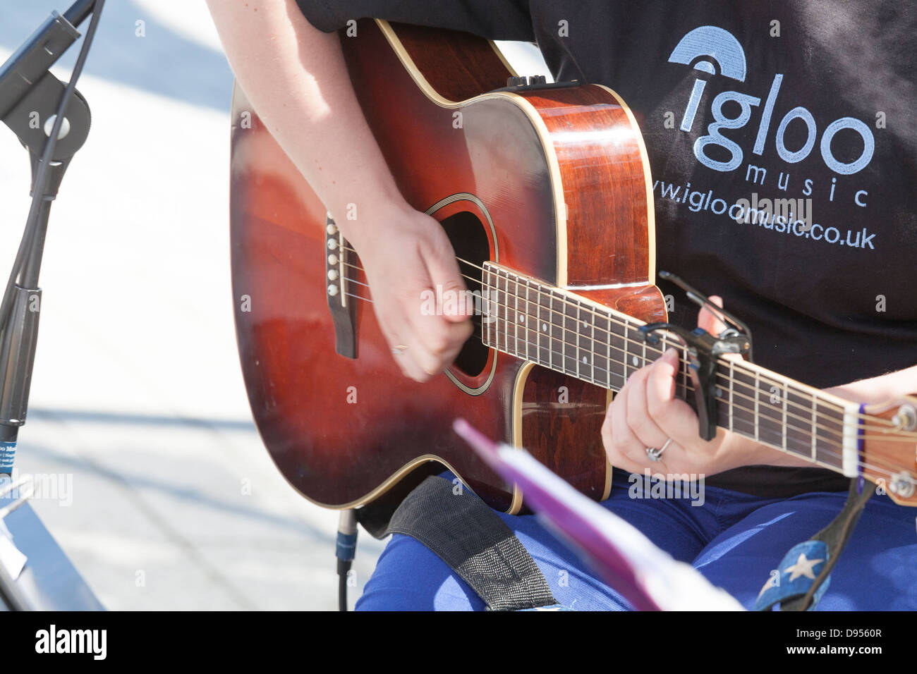 close up of playing guitar and frets Stock Photo