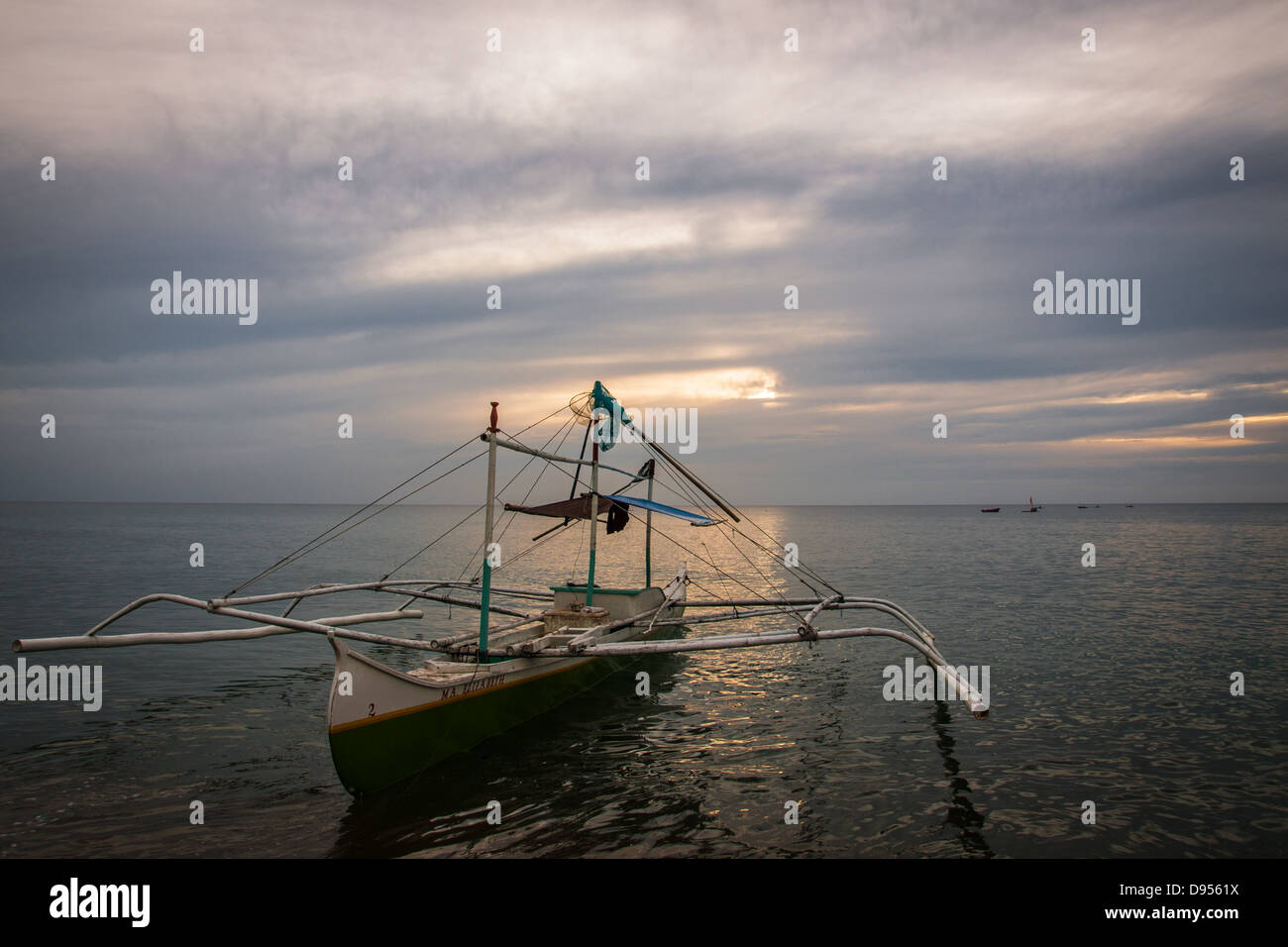 Bangka - a traditional Filipino fishing boat - moored for the day at ...