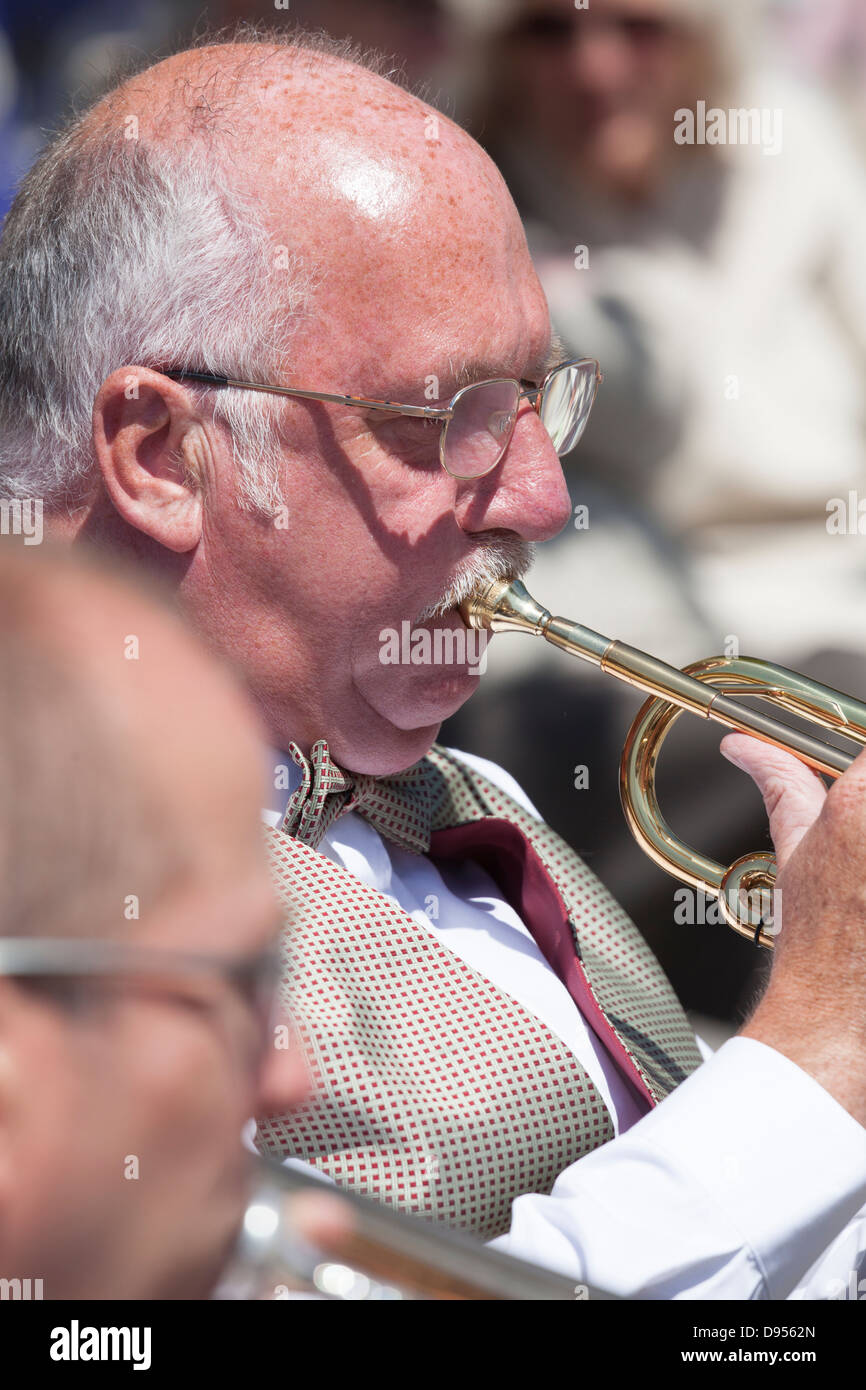 close up of male with moustache playing trumpet Stock Photo Alamy