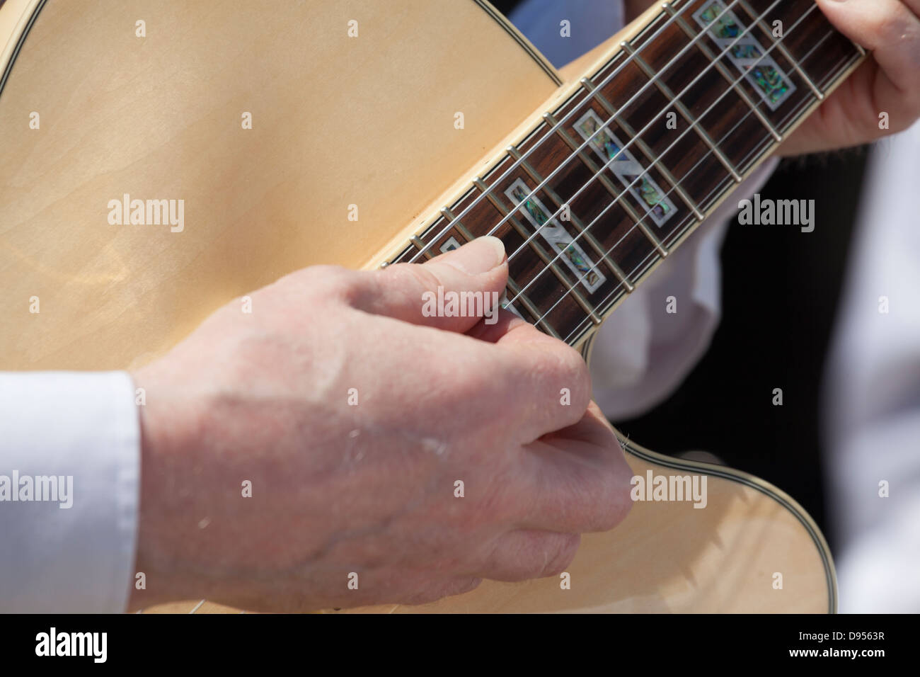 close up of guitarist hand strumming Stock Photo Alamy