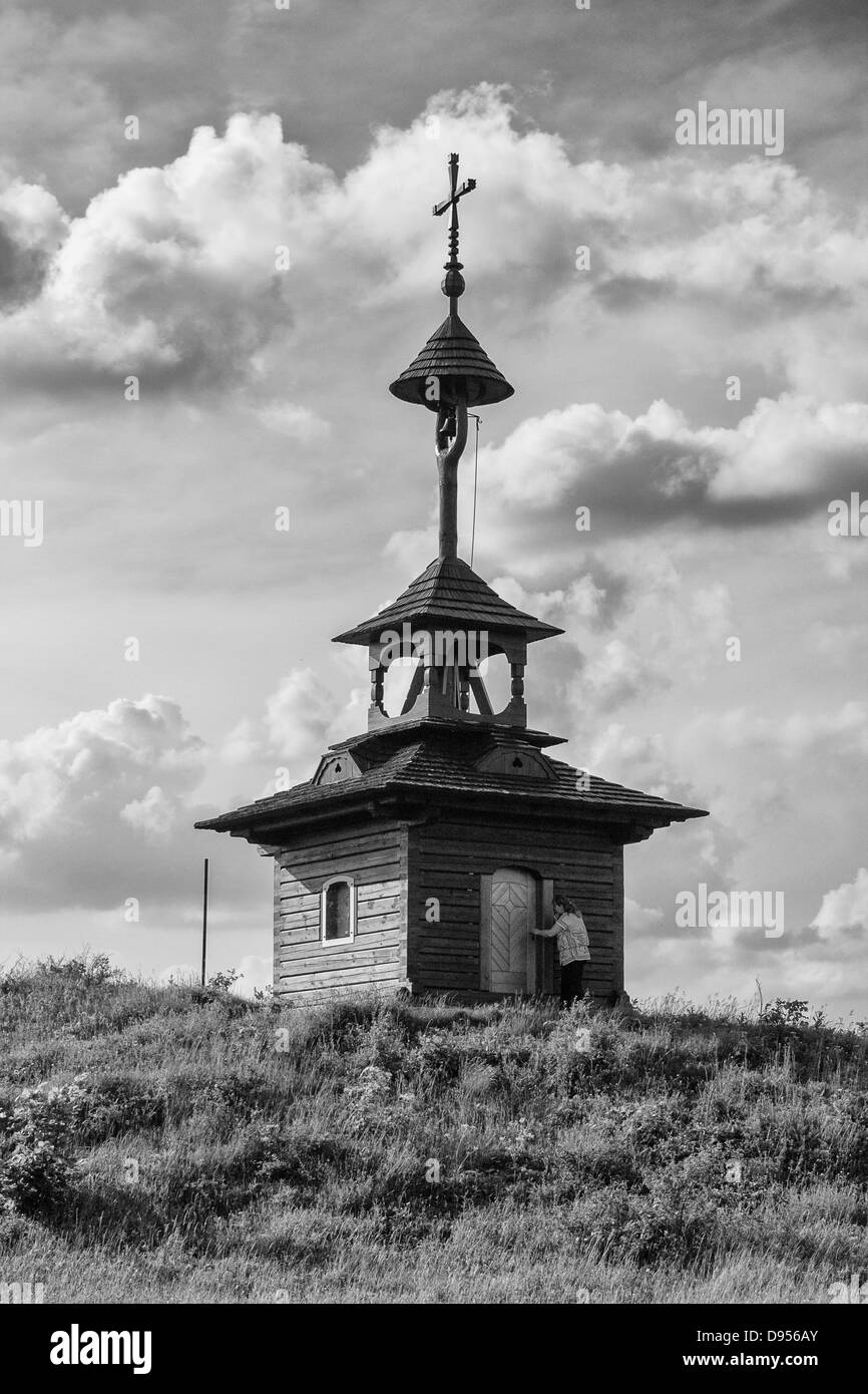 Wooden belfry on a hill Stock Photo