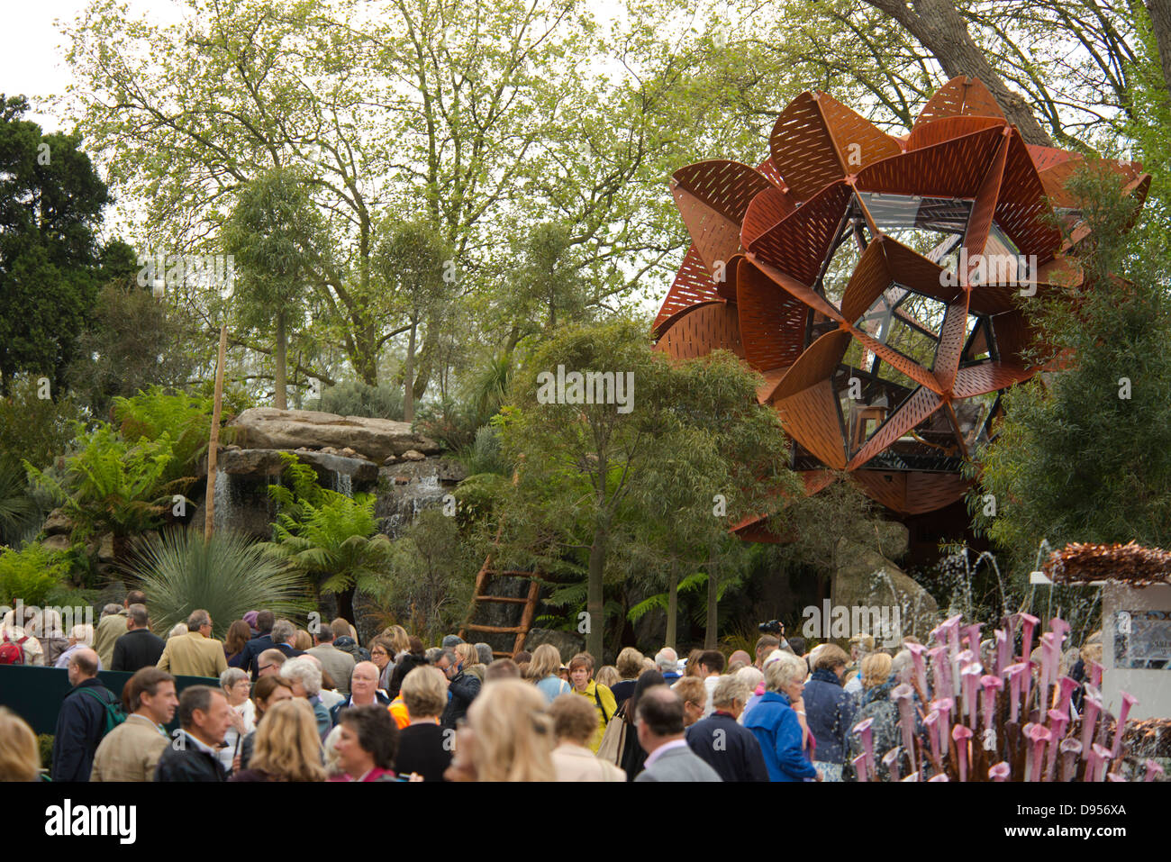 Visitors to the RHS Chelsea Flower Show in 2013 next to the Trailfinders Australian Garden, winner of the best show garden award Stock Photo