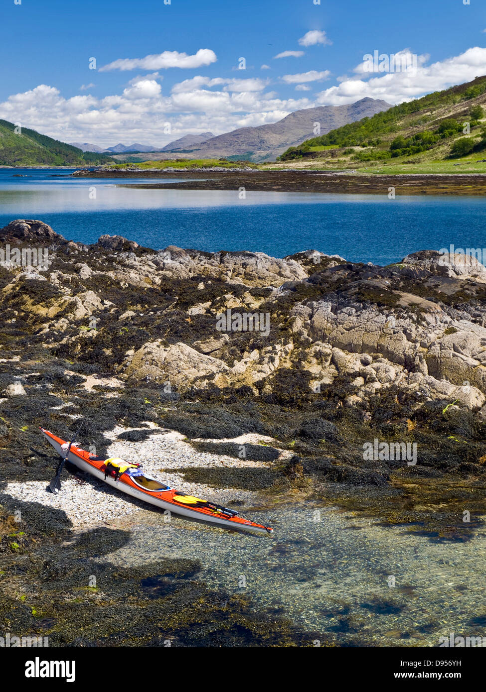 Loch Sunart, Scotland with sea kayak on beach Stock Photo