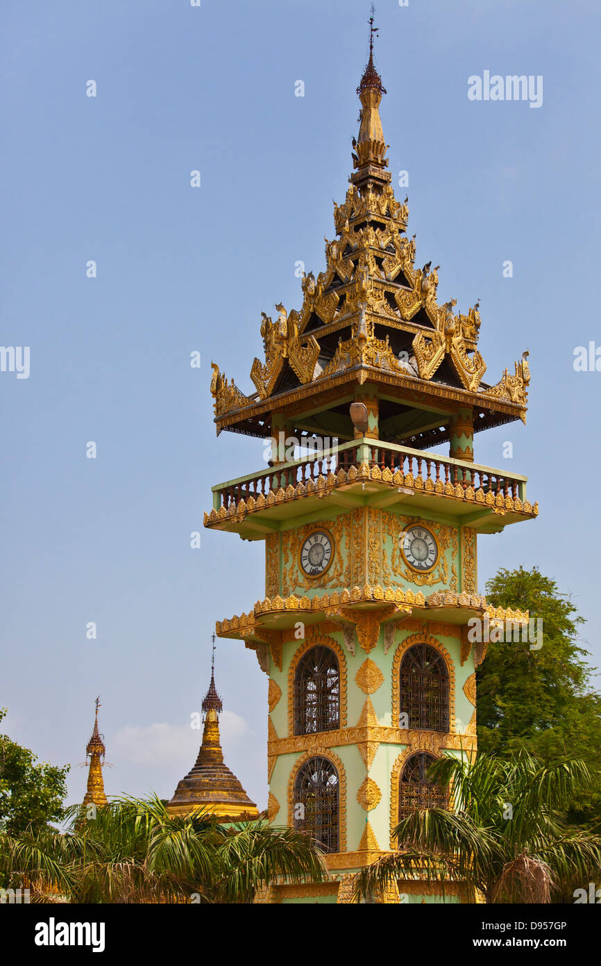 CLOCK TOWER at YADANA LABAMUNI HSU TAUNG PYE PAYA or the SNAKE PAGODA in PALEIK famous for its sacred BURMESE PYTHONS - MANDALAY Stock Photo