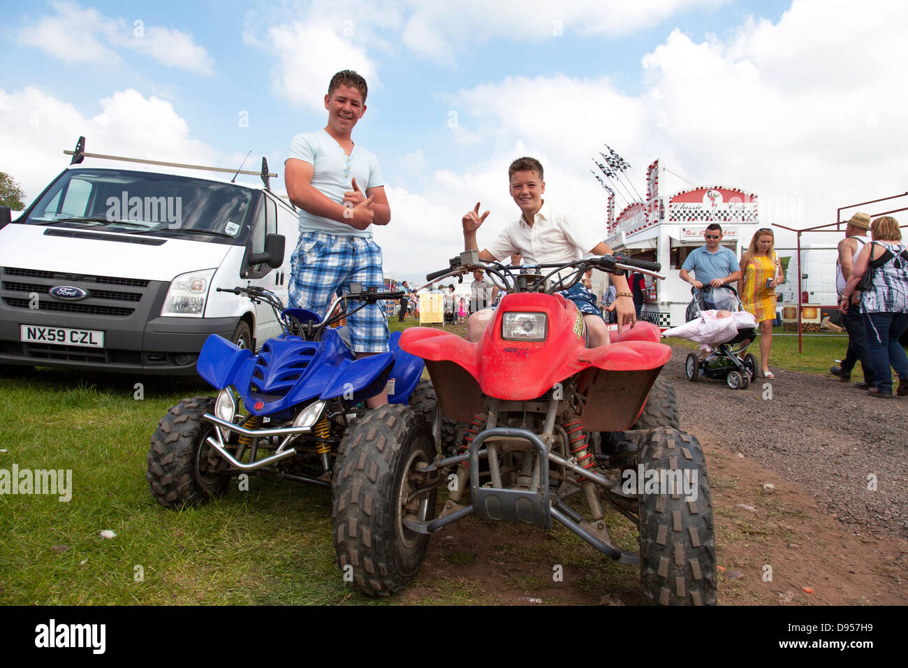 Gypsy boys riding quad bikes at the Appleby Horse Fair, Appleby-in-Westmorland, Cumbria, England, U.K. Stock Photo