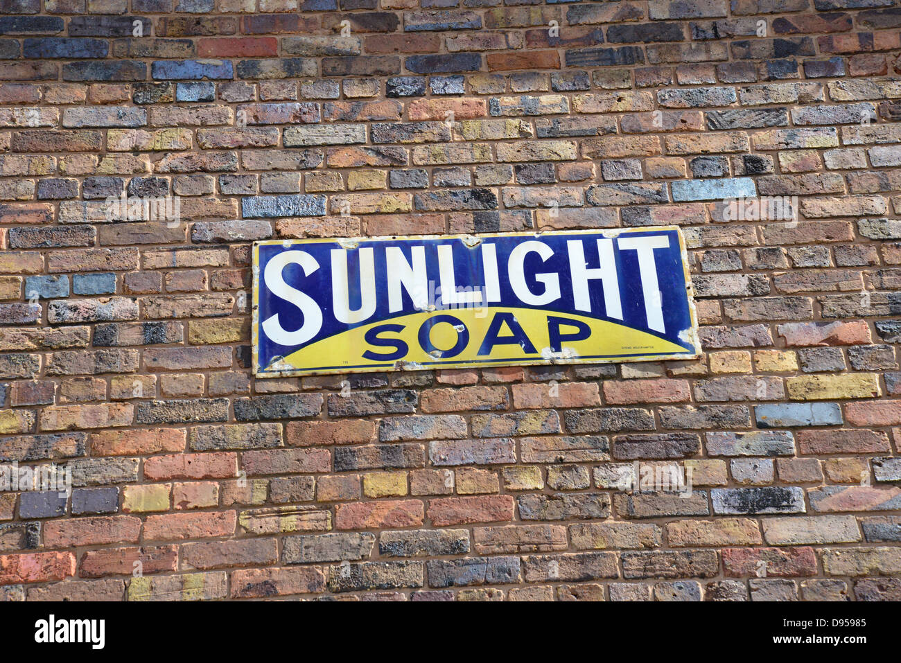 Tin metal 'Sunlight Soap' sign on wall, Blists Hill Victorian Town, Madeley, Telford, Shropshire, England, United Kingdom Stock Photo