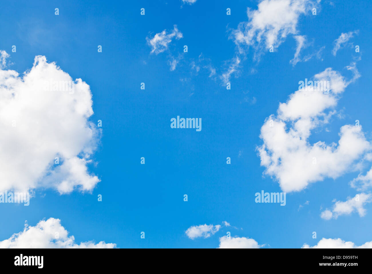 small clouds in blue sky in March, France Stock Photo
