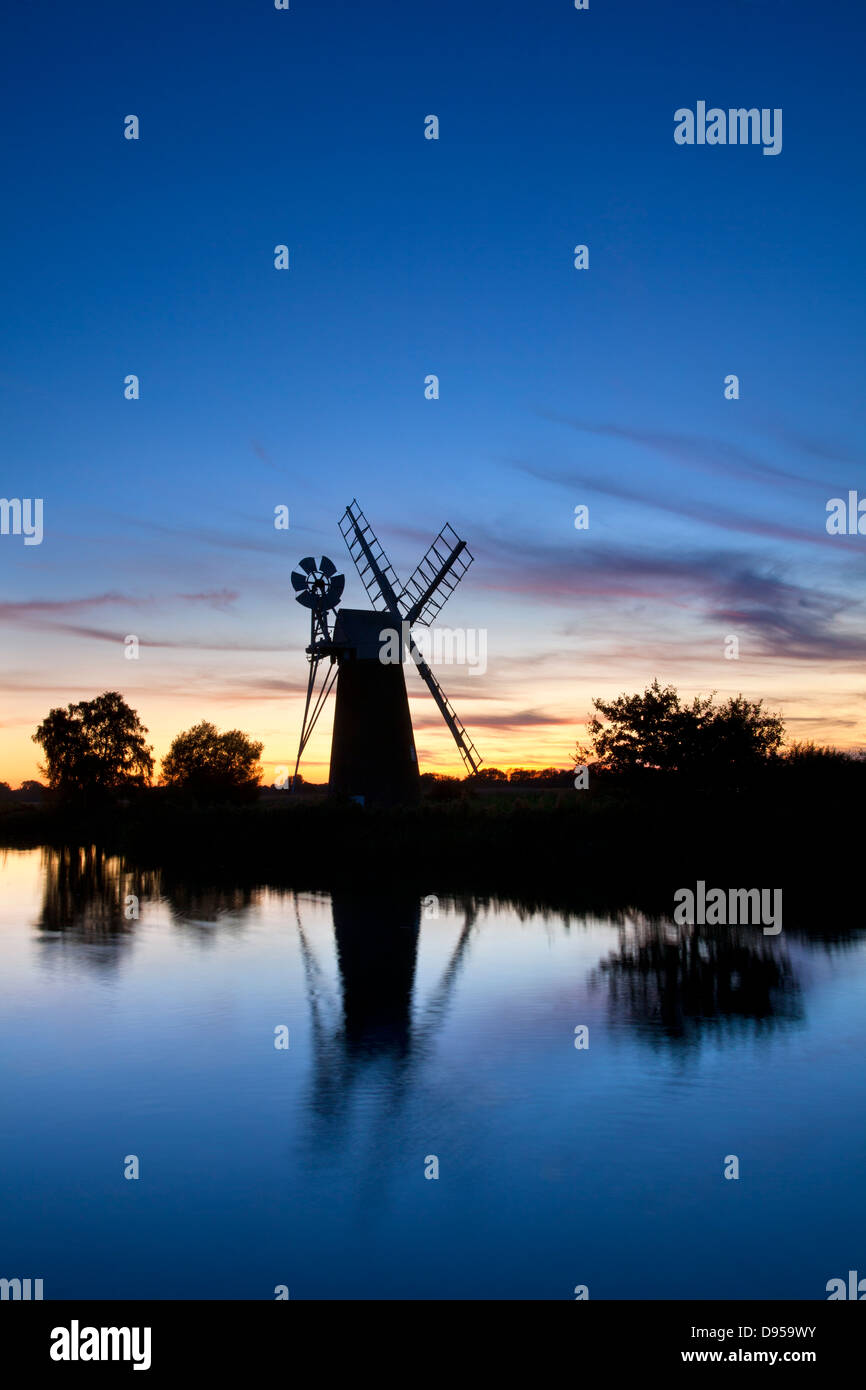 Turf Fen drainage mill at sunset on the River Ant, Norfolk Broads Stock Photo