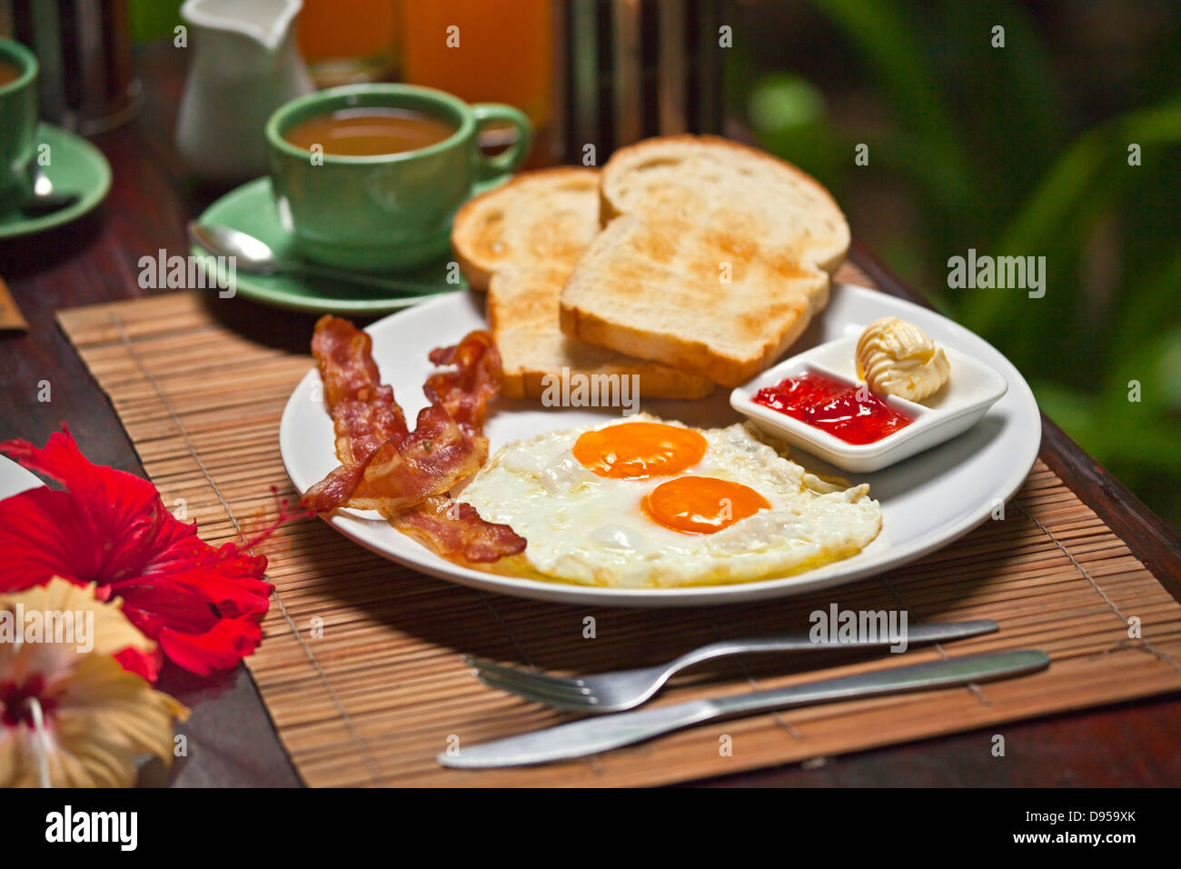 An AMERICAN BREAKFAST served at OUR JUNGLE HOUSE a lodge in the rainforest near KHAO SOK NATIONAL PARK - SURATHANI PROVENCE, THA Stock Photo
