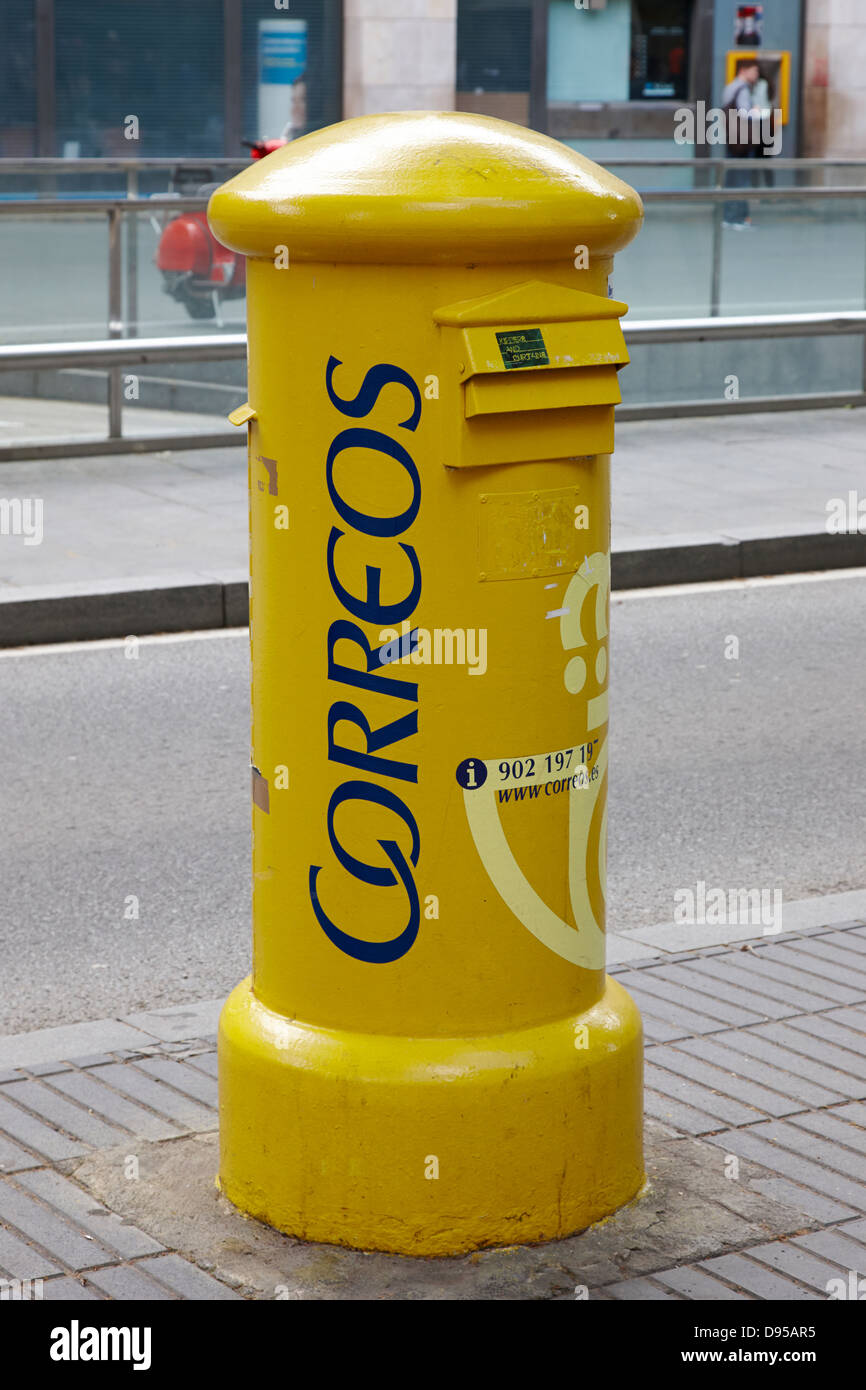 correos yellow post box barcelona catalonia spain Stock Photo Alamy