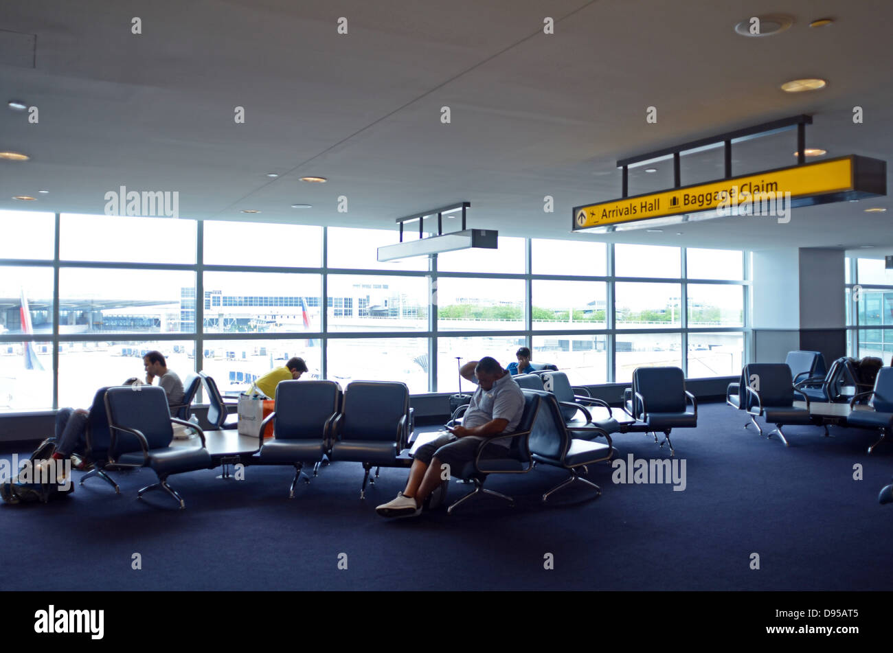People waiting in gate for departure, Terminal 4 of JFK airport, New