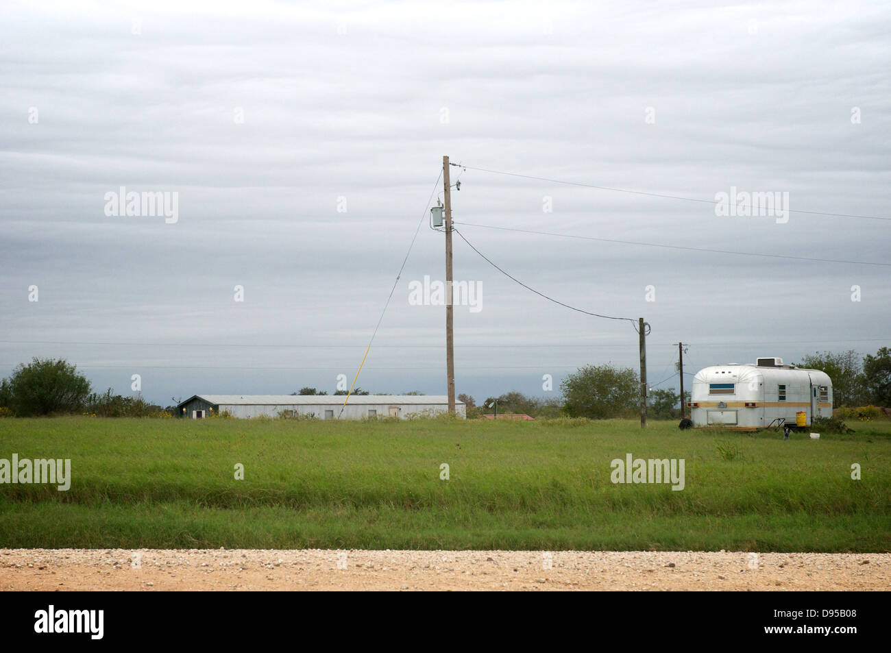 A trailer sits in a field in Texas, USA. Stock Photo
