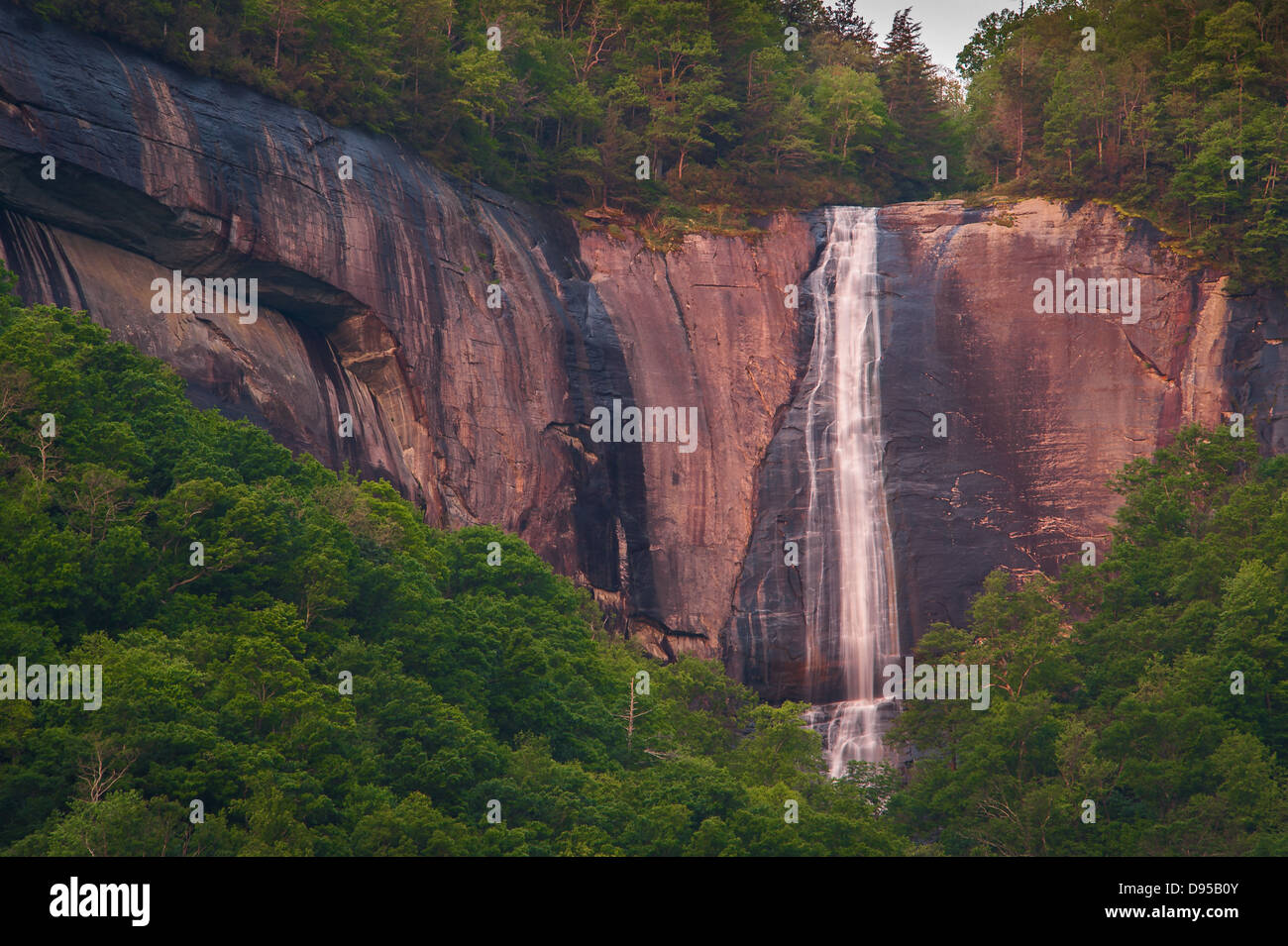 Hickory Nut Falls in Chimney Rock Park North Carolina USA. Color image shows the massive rock formation that makes up the park. Stock Photo