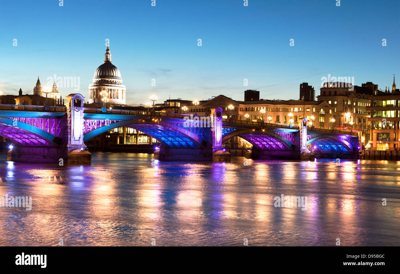 Southwark Bridge and St. Pauls at Dusk London UK Stock Photo